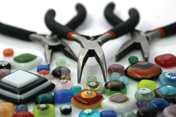 needle nose pliers and colorful glass beads
