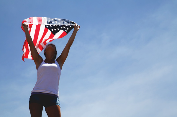 woman holding american flag