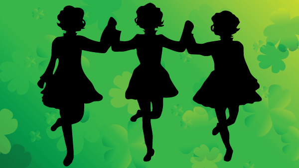 silhouette of irish dancers on shamrock background