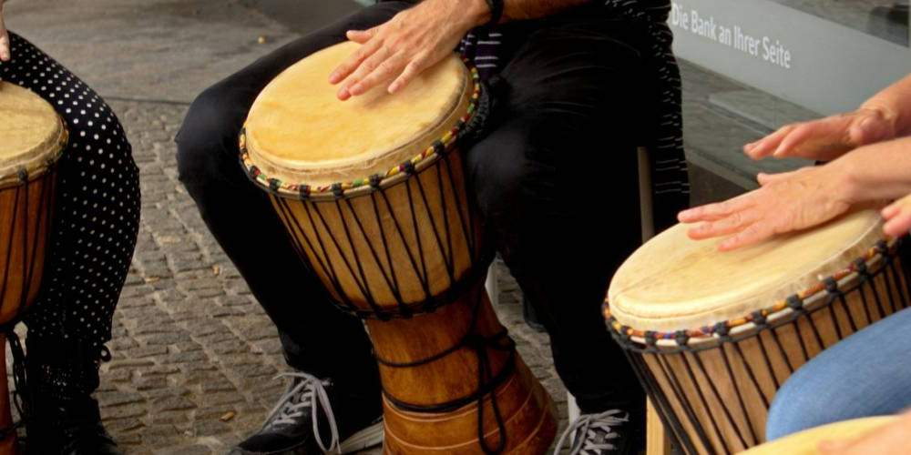 Hands on an African drum